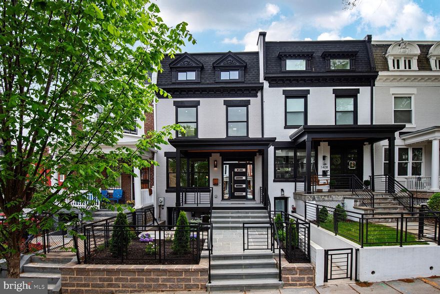 Transformative rebuild and expansion of a 16th Street Heights Rowhome. All the architectural ambiance of period Architecture blended perfectly with modern design, and open concept living. This refined six bed-room three and one-half bath residence has left nothing to the imagination save your decorating style and furnishings.  The front elevation offers an iron gated front garden with flag stone patio and oversized walkway extending to the entry to the front porch and access to the lower level. Impressive and sleek one-piece pivot door with encased windows and double side lights create a bold and commanding entrance with fortress security. The first floor has massive windows, rustic oak engineered flooring, and a modern kitchen featuring all the gourmet accouterments a chef would demand.  Stainless KitchenAid appliances with a 36 inch six-burner range with requisite pot filler, ample storage in stacked ceiling height cabinetry, and seating for six at the waterfall quartz stone island.  An oversized dining space adjacent to the island and open space beyond for additional recreation. A wine bar area with wall of hardwoods accentuates warmth and allows for decorative imagination as well as additional storage. 

Ample and exquisite use of space is amplified as you ascend the cubed modern stairs to the primary suite. You are welcomed to the space with oversized windows, nine-foot Cathedral ceilings, double closets with built in walk-in spaces and an ensuite spa bath. Double vanity sinks, frameless glass shower, pedestal soaking tub, a skylight and elegant timeless Carrera marble tile surround.  Equally appointed second and third bedrooms offer direct access to an oversized second floor engineered deck with views of the verdant grounds. The second and third bedrooms are serviced by an equally furnished hall bath with soaking tub. A full-size side by side washer and dryer with quartz stone folding space make laundering a pleasure.

The lower level is a guest or nanny suite with rear and front entrances, recreation space, a full bath, and warm engineered flooring.  A main bedroom, and two additional bedrooms or dual office spaces flank the front and rear of the lower level.

The kitchen space and dining room are connected to exterior via a wall of  foldable nano-door windows that open completely giving you an eight foot open space connected directly to the oversized Trex Deck,  manicured rear sod, and two-car off street parking pad.  A commercial roll up garage door and electric vehicle charging port finish the space. The rear concrete areaway makes the lower level feel above grade.

All systems are new, plumbing, 200 AMP electrical service, and dual HVAC systems for true two zoned heating and cooling. All windows low E double Thermal Pane, and double hung. New cool white TPO roofs, and Trex decking installed. If you are looking for timeless elegance in a suburban/urban setting, with easy bus access to all of the Metropolitan area, this is the home you have been hoping would come along. The latest addition to the renovated canvas of rebuilt homes  from prolific local builder Center Point Properties.