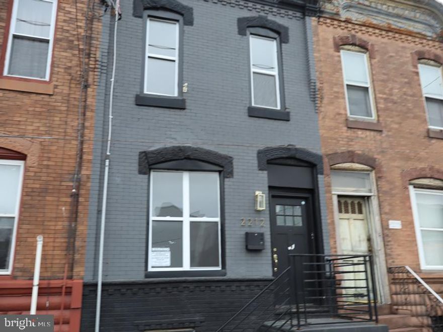 This is a fantastic opportunity to own a two-story brick row home with a stucco front exterior, originally constructed in 1920, located in the desirable South Philadelphia section of the city. The property offers convenient access to Center City and is within close proximity to public transportation, making it ideal for commuters.

The main level features an open-concept layout, seamlessly connecting the living and dining areas, along with a convenient powder room. The modern kitchen provides direct access to the rear yard, offering additional space for outdoor enjoyment.

The upper level includes three generously sized bedrooms, two full bathrooms, and ample closet space throughout. A fully finished basement adds valuable additional living space, perfect for a family room, home office, or recreation area.