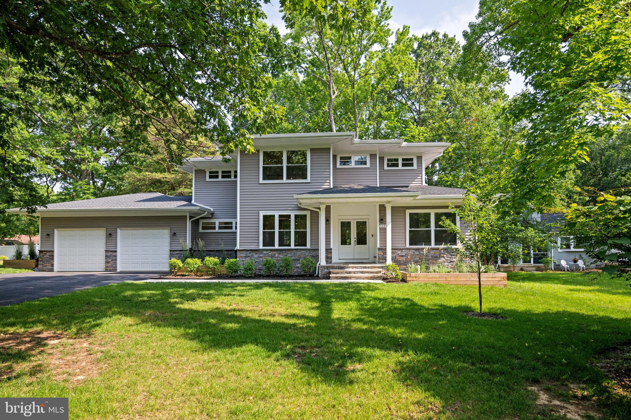 Discover elegance at 1227 Cross Road in Annapolis, Maryland, a stunning 2023-built home in the water-privileged Oyster Harbor community, elevated by upgrades made by the current owner since purchase. Enter through grand double doors into an open foyer with hickory hardwood floors, soaring ceilings, and crown molding. The great room impresses with a coffered ceiling, ceiling fan, fireplace, and large windows that flood the space with natural light.
The gourmet kitchen is an entertainer’s dream, featuring a 5-foot quartz island, double oven, prep sink, breakfast nook, expansive walk-in pantry, and a butler’s pantry/wet bar upgraded by the owner for effortless hosting. The formal dining room, with its trey ceiling and designer windows, adds sophistication. A main-level office or in-law suite includes a full bath, ceiling fan, and custom California Closets added post-purchase for enhanced organization.
Ascend the stunning, light-filled staircase—a true architectural centerpiece—to the second floor. Here, a versatile loft/flex space is perfect for a family room, home office, or play area. Two additional bedrooms with ceiling fans and owner-installed California Closet systems offer comfort, with one boasting private bath access and a walk-in closet. The primary suite is a retreat, featuring recessed lighting, a trey ceiling, a spacious dressing/sitting area, a luxurious 6x6 shower, and a large walk-in closet with a California Closet upgrade. A laundry center, enhanced by the owner with custom cabinetry, granite countertops, and a Blanco sink, adds convenience.
The oversized 2-car garage features 12-foot ceilings, an owner-applied epoxy floor, and a 240V electric vehicle hookup. A mudroom with custom storage cabinetry, added post-purchase, welcomes you from the garage. Additional owner upgrades include gutter guards, Cat6 wiring, pre-installed security system wiring, and a 1,500 sq ft conditioned crawl space for storage. Outdoors, relax on the 13x10 screened porch with recessed lighting, a thoughtful owner addition.
Enjoy Oyster Harbor’s waterfront amenities, including a boat ramp, pier, private beach, and opportunities for kayaking, fishing, and paddleboarding. With the current owner’s thoughtful upgrades since 2023, this Annapolis gem combines modern luxury with unparalleled functionality.
View the full HD Video Tour and contact listing agent for a private in person tour.