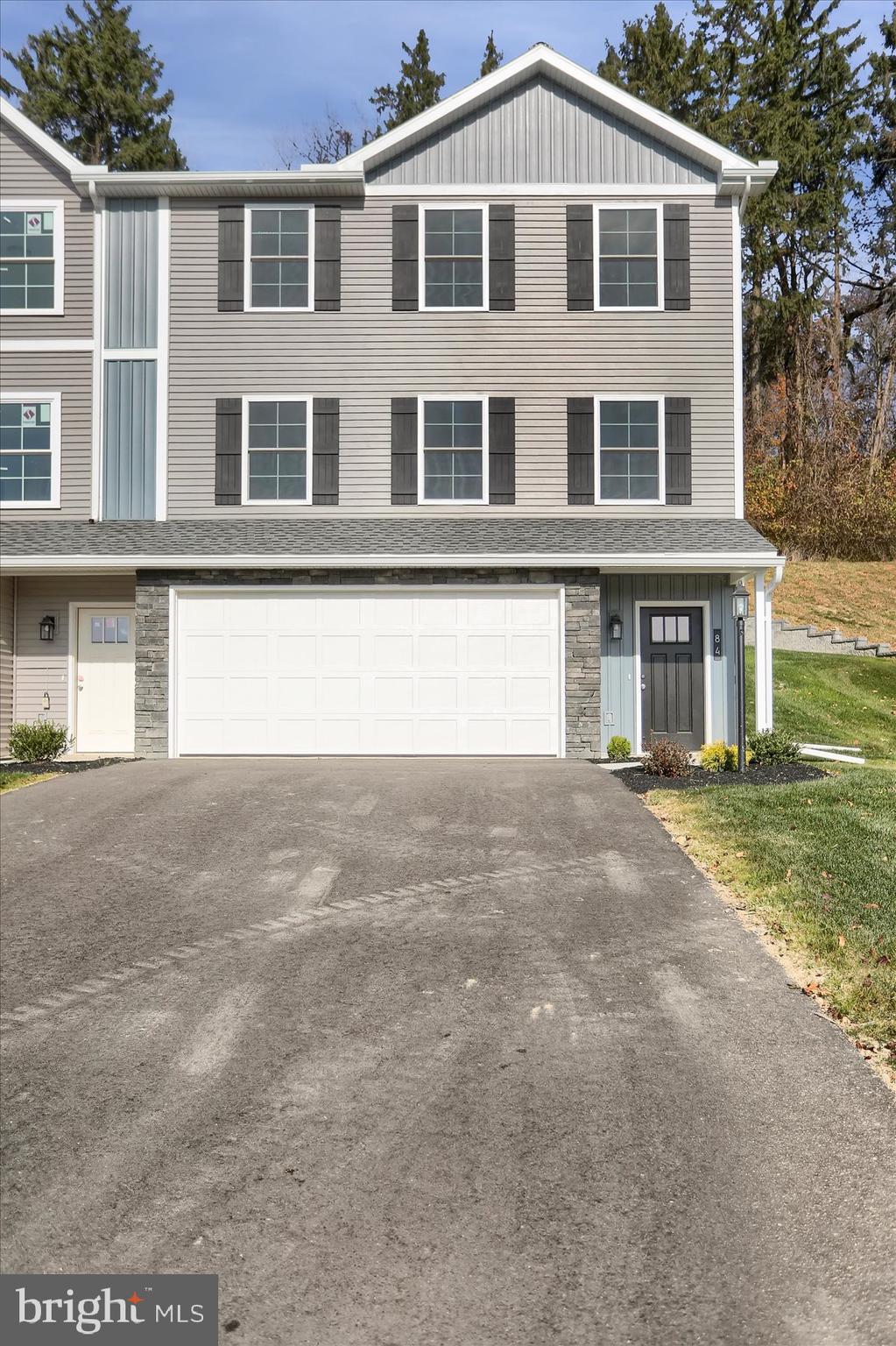 OPEN HOUSE SUNDAY 9/28 1-3PM. Lots of living can be done when the lawn maintenance and snow removal are done for you. Enjoy this 3 BR, 2.25 bath townhouse in the areas premier development: Monroe Manor. Brand new and soon ready for you. The 1st floor laundry and two car integral garage make this home convenient living. Sq ft data is from builder drawings. Select photos virtually staged. Lot Size Estimated. Parcel runs to next door end parcel. GIS is Incorrect.