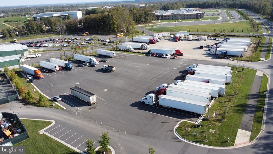 Introducing a rare opportunity to own a remarkable 2.3-acre M1 zoned paved lot located at 13220 University Blvd, Gainesville VA 20136.

Positioned in a highly sought-after location, this property offers endless possibilities for investors and businesses alike. With its desirable M1 zoning, this expansive lot presents a lucrative opportunity for a variety of industrial uses. Situated in a vibrant area with strong economic growth, this lot is surrounded by thriving businesses, major transportation routes, and a bustling community. Boasting a fully paved surface, this lot provides ease of access with 2 ingress/egress point and the flexibility to accommodate a range of operations. Fully approved and operating as a Tractor Trailer Parking Facility with 38 tractor parking spots, and produces $16,000/month gross income from month-to-month rentals. Electricity is already established on the lot, and water and sewer are extended to the property line and available for hookup. With nearly 300 feet of road frontage, it’s an excellent opportunity to service the heavy industrial businesses operating within a 5 mile square radius. Don’t miss this rarity!