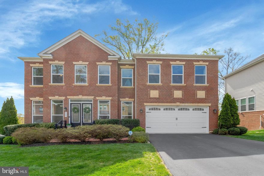 Welcome to this rare opportunity to own a stunning luxury residence in one of West Springfield’s premier and newest community—Park Pointe. Built in 2016 and nestled on one of the most pristine corner lots in the neighborhood, this exquisite home offers over 6,000 square feet of refined living space and upscale finishes throughout. Step onto the charming brick walkway and enter through the grand two-story foyer, where natural light pours in and a dramatic sweeping oak staircase with iron balusters sets the tone. The home features sleek hardwood floors, designer cabinetry, and a rare three-level deck, perfect for entertaining or unwinding in style. The main level includes a spacious guest suite with a walk-in closet and full bath—ideal for multi-generational living or visitors. The gourmet kitchen is a chef’s dream, complete with an extended island, custom cabinetry, and an adjacent butler’s pantry that connects to the elegant formal dining room. The expansive family room with a striking stone fireplace flows seamlessly into a sunlit bonus room, perfect for a play area or home office. Upstairs, all bedrooms offer plush upgraded carpeting and generous closet space. The luxurious owner’s suite is a true retreat—featuring a large sitting area, two walk-in closets, and an additional flex room ideal for an office, nursery, or private lounge. The spa-inspired ensuite bath boasts a corner soaking tub, frameless glass shower, and dual vanities. The walkout lower level adds even more living space, featuring two additional bedrooms, two full baths, engineered flooring, and a large recreation room ready for movie nights, game days, or gatherings. Additional highlights include an oversized two-car garage with ample storage, dual electric car chargers, full irrigation system, and a premium end-lot location offering added privacy and curb appeal. Don't miss your chance to own this magazine-worthy home in one of the area's most desirable communities. Schedule your private tour today!