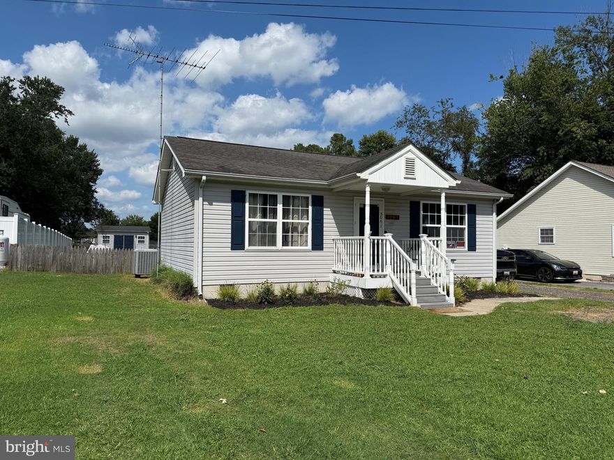 Step into this delightful home that perfectly blends comfort with convenience. The open-concept living and kitchen area creates an inviting space for relaxing or entertaining, complete with effortless flow and natural light. With two well-sized bedrooms and a full bathroom, it's ideal for small households or anyone seeking a cozy oasis.

From the kitchen, step out onto the oversized back deck—your new favorite spot for morning coffee or sunset gatherings. It overlooks a spacious, fully fenced backyard that’s perfect for pets, play, or gardening dreams, and includes a handy storage shed for your tools and treasures.

Move-in ready with nothing left to do but enjoy the charm and possibilities this home offers!