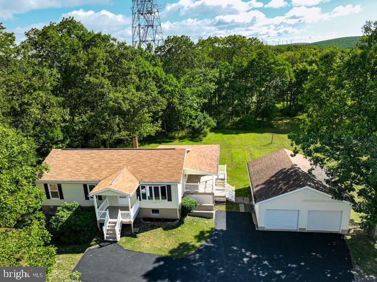 Welcome to your newly remodeled 3 bed/1 bath home nestled on a generous 1.76-acre lot just minutes from I68! This stunning property boasts a paved driveway leading to an oversized 2 car garage, perfect for all your storage and parking needs.
Step inside to find a beautifully updated kitchen featuring stainless steel appliances and ample cabinet space. Enjoy the convenience of a water filtration system throughout the home, ensuring clean and fresh water.
Relax and unwind in the cozy sunroom, perfect for soaking up the sunshine and enjoying the picturesque views of the surrounding landscape. This property truly offers the perfect blend of indoor and outdoor living.
Don't miss your chance to own this charming home in a tranquil setting, contact us today to schedule a showing!