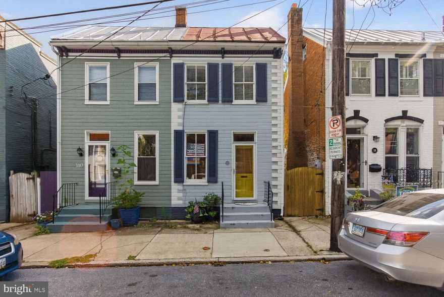 Wonderful row home in Downtown Frederick just off N Market Street, close to Baker Park & Hood College.
New floor in basement with washer & dryer and new full bath.  Hardwood floors on main , second and third floor bonus room.  Rear deep yard is nicely landscaped  and has off street parking for four cars.
