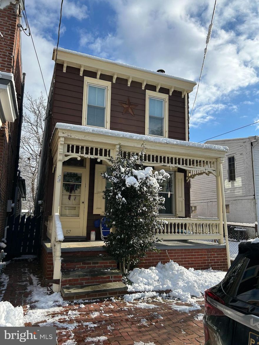 Detached 3-4 bedroom colonial style home in Historic New Castle with lots of updates!   Freshly painted, new kitchen with appliances, new bathrooms, new mini-splits.   While updating the home, the owner has kept some of the unique features such as tin ceilings, built-in cabinets, and hard wood floors to name a few.  Enjoy the back porch and fully fenced-in oversized back yard.