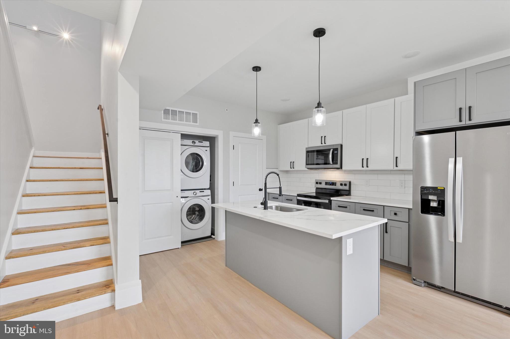 *Available Now!* - New construction 2bd/1.5 bath apartment available in Hot Norris Square. This apartment features a huge living room with high ceilings, lots of natural lighting, wide-plank hardwood flooring, large windows, a video intercom, and a private rear patio. The modern kitchen has white cabinets, granite countertops with natural veining, subway tile backsplash, and stainless steel appliances - including a washer/dryer in the unit. There is energy-efficient central heating/cooling, LED recessed lights throughout, and custom metal railings. The primary bedroom has a large walk-in closet and ensuite primary bathroom with glass shower and porcelain marble tile. Two bedrooms and two full bathrooms are located in the basement. NO DOGS ALLOWED. 1 Cat Allowed. Pet Deposit TBD. The Neighborhood: Only a few blocks from Fishtown and Northern Liberties, one block from Norris Square Park, 2 blocks to the Market-Frankford Line, restaurants/bars everywhere such as Evil Genius Brewing, Human-Robot Brewing, LMNO, Front St Cafe, Laser Wolf, Suraya, Pizzeria Beddia and surrounded by new construction projects. Hop on I95 within a few blocks for quick highway access. Schedule your showing today!!!! Tenant Requirements: Applicants to make 3x the monthly rent in verifiable net income, credit history to be considered, no evictions within the past 4 years, and must have a verifiable rental history with on-time rental payments. Exceptions to this criteria may exist under the law and will be considered.