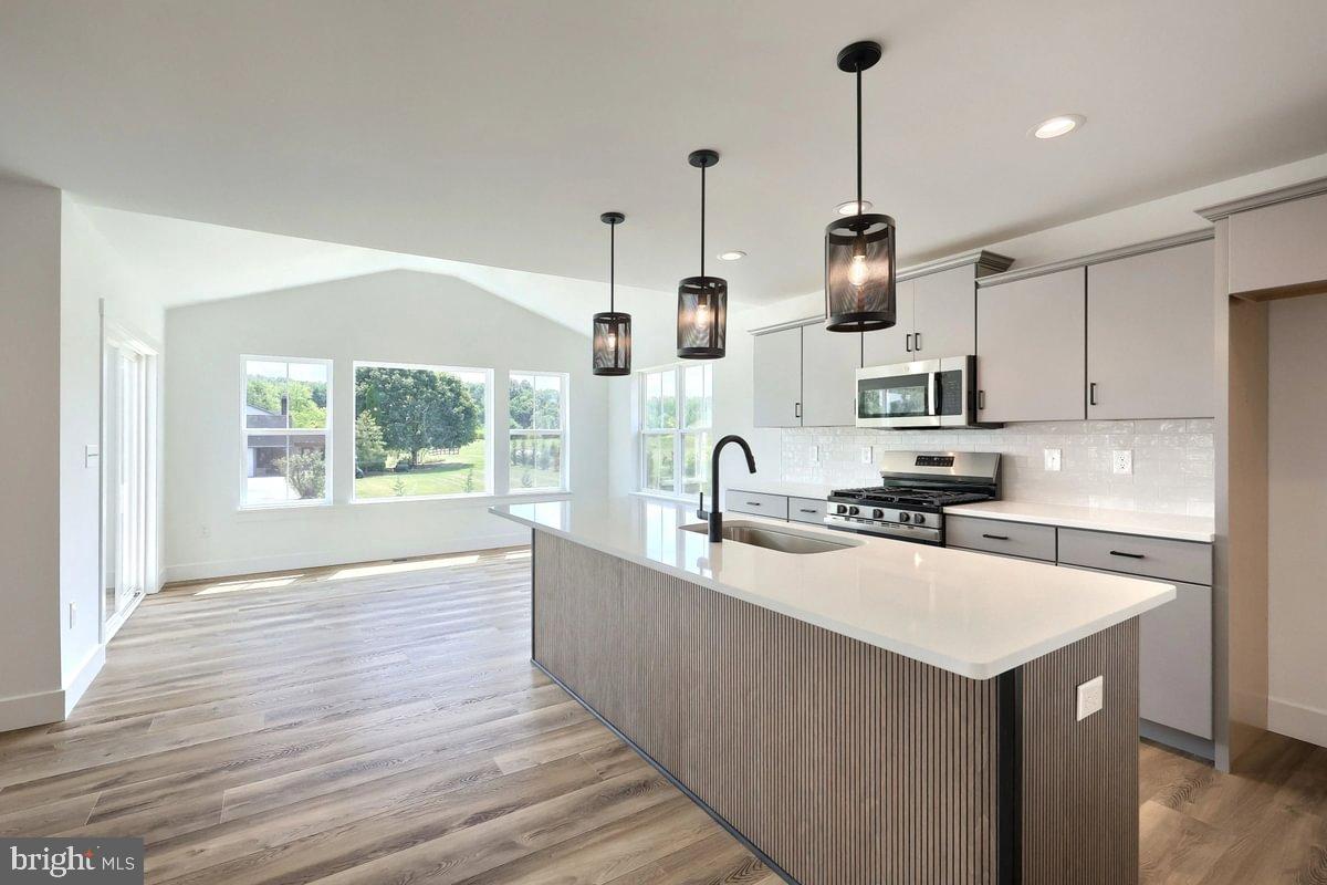 🎁 Move-In Ready + $10,000 to Use Your Way! Whether you choose a rate buydown or help with closing costs, this incentive makes your brand-new home even better. See attached brochure for full details. Expires 9/30/2025
🖼️ Images reflect the actual home as built.
Step inside to an open, light-filled first floor featuring a spacious kitchen with alternate package upgrades — island, pendant lighting, quartz countertops, upgraded faucet, tile backsplash, stainless steel undermount sink, rollout trays, and a trash bin cabinet. The morning room expansion creates a bright, inviting dining area, and the generous great room with transom windows offers versatile space for gatherings or relaxation.
Upstairs, the expansive owner’s suite includes two walk-in closets and a private bath with double vanity, tile shower with seat and tile base, and a frameless sliding door. Three additional bedrooms, a second full bath, and a convenient second-floor laundry add function and ease.
Additional upgrades include a stone-to-sill front, open-tread staircase, mudroom bench, recessed lighting, smart deadbolt, upgraded plumbing and lighting fixtures, 2-tone paint, garage door opener with keypad, and more. A 10-Year Warranty is included for peace of mind.
Schedule a tour today — this home is ready for you now!
Subdivision assessment is pending; MLS reflects zero taxes. Final taxes will be determined based on the improved lot and dwelling assessment.