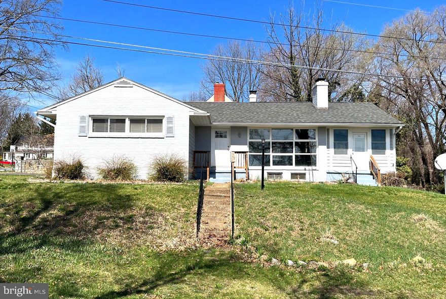 Move In Ready, 3-bedroom 1.5 bath rancher, sitting on a partially finished basement in Charles Town. This home has over 2200 total finished square feet and overlooks Charles Towns City Park. Features include: a sunroom, attached carport, tiled shower, two fireplaces, and newly refinished hardwood floors throughout the main level, as well as LVP flooring in the basement. Schedule a showing today!