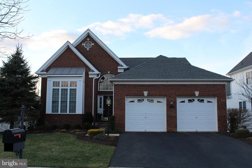 Welcome Home To The Regency at Dominion Valley.  Rarely available rental home in 55+, gated community.  Main Level Bedrooms plus lower level Rec Room and Powder Room.Covered back porch that overlooks wooded, common area.  Lawn care, trash, basic cable, internet are included in monthly rent.