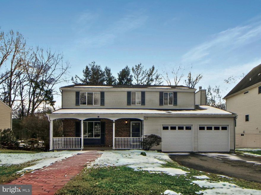 Renovated 4 bedroom, 2.5 bath colonial in sought after location loaded with upgrades. This home shines and is move in ready! Plenty of living space on 3 finished levels on a large lot backing to woods, fresh neutral designer paint, new wide plank floors on main and bedroom level, all new lighting, updated kitchen and baths are just a few reasons this home is such a gem. Rich hardwood flooring welcomes you in the foyer and ushers you into the living room with warm on trend paint, a lighted ceiling fan and large picture window filling the room with natural light. The formal dining room features a contemporary glass shaded chandelier. The updated kitchen is sure to please with pristine white cabinetry, gorgeous gleaming granite countertops and stainless steel appliances. The adjoining breakfast nook is perfect for daily dining and opens to the large family room with cozy fireplace, making entertaining family and friends a breeze. Sliding glass doors lead to a multi-level deck and rear yard backing to woods. Perfect for grilling and outdoor fun. A half bath rounds out the main level. Hardwood floors continue upstairs where the primary bedroom boasts a large walk in closet and updated private bath with upgraded vanity, custom tile and glass door tubs/shower combo. 3 more spacious and bright bedrooms share the updated hall bath. The walk up lower level has plenty of space of games, media and relaxation with a large recreation room and den/office. 
All this in a great community with no HOA, a location that is a commuter's dream, close to 495/95 and with plenty of diverse shopping, dining and entertainment nearby.
NOTE: The photos show tile in the basement - new carpet was just installed to give it a warmer and cozier feel. 
***The deck is being rebuilt as soon as the weather permits.***