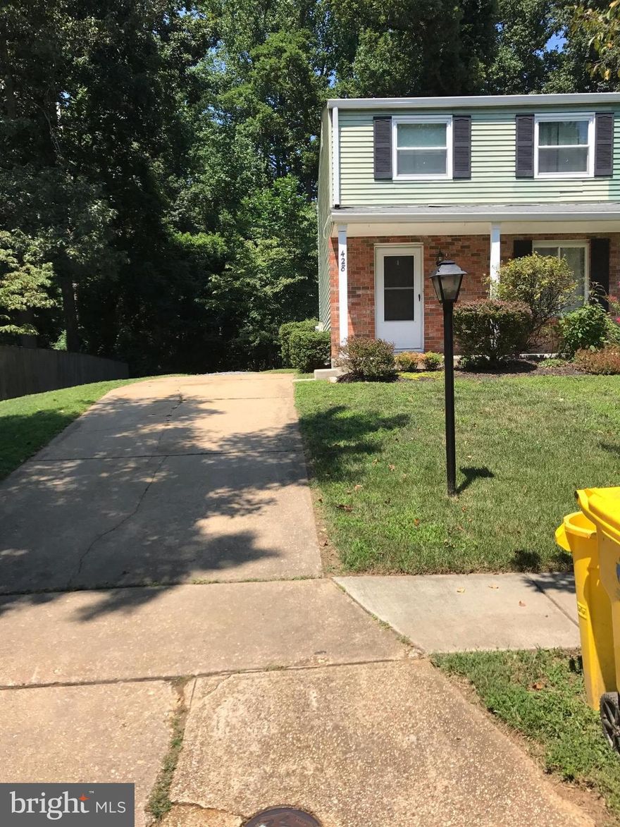 Being Sold AS IS! Colonial Duplex with 3 bedrooms and 2 full bathrooms, kitchen, dining room, living room, family room, laundry, back yard backs to woods for privacy.