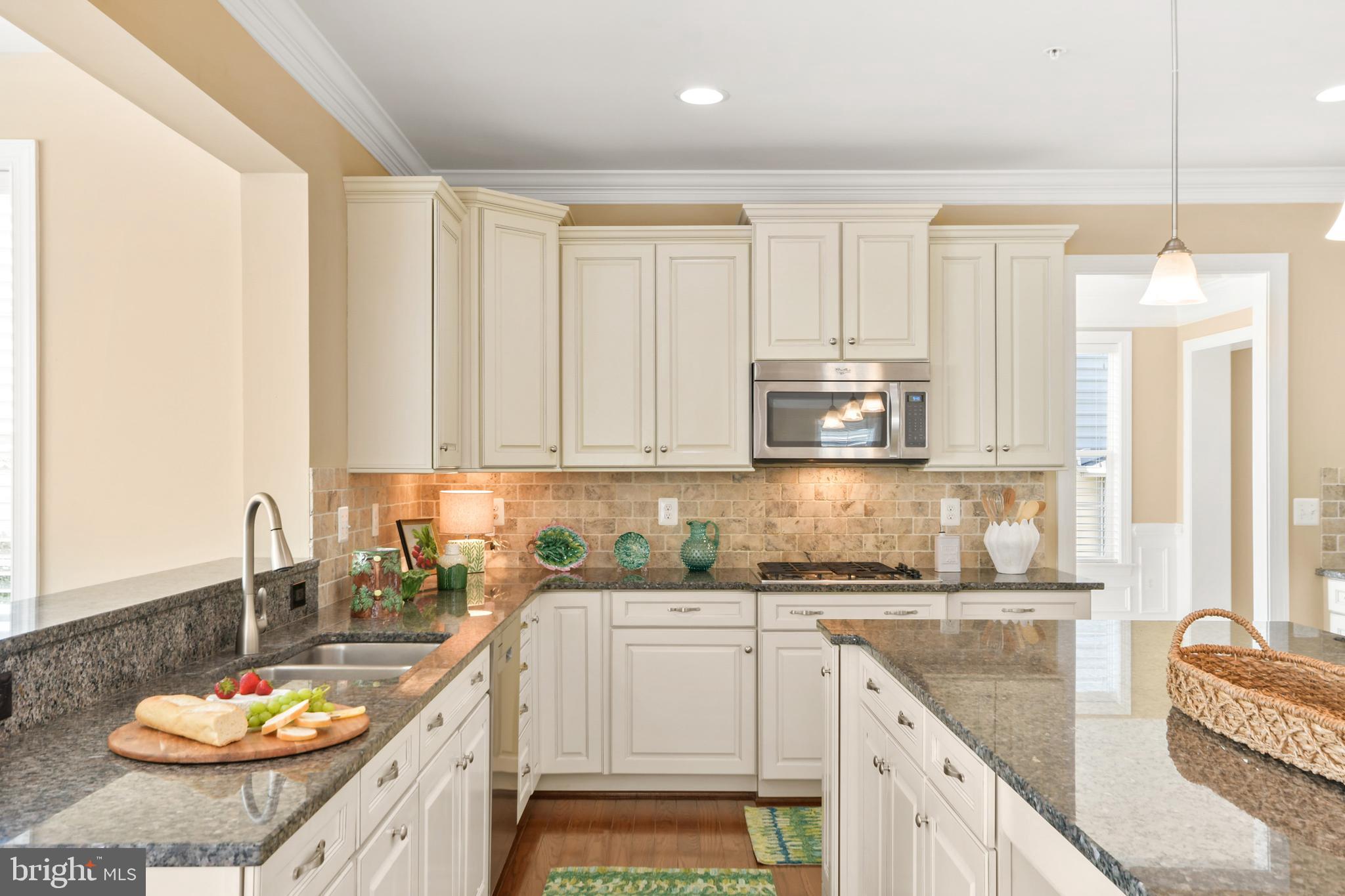 Nestled on a peaceful, tree-lined street in the heart of Brunswick Crossing, this charming and light-filled home offers nearly 4000 square feet of warmth, character, and timeless appeal. With 4 bedrooms, 3.5 baths, it blends classic charm with modern convenience.
Step inside to discover custom moldings throughout, adding elegance and detail in every room. The gourmet kitchen is a chef's dream complete with a large center island, quality finishes, and plenty of space for entertaining and everyday living. Upstairs, the luxurious Owner's Suite is a true retreat, featuring a spacious sitting area, three walk-in closets, and a spa-inspired bath designed for relaxation.
The unfinished lower level provides a blank canvas with endless possibilities whether you envision a rec room, home theater, gym, or additional living space.
From it's welcoming front porch to its thoughtfully designed interior, 1212 Volunteer Drive is a home where comfort meets style in one of Brunswick's most desirable communities.
Perfect House | Perfect Location | Perfectly Priced!