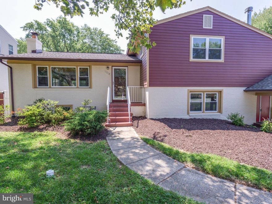 LOVE AN OPEN CONCEPT?? Don't miss this 4-level split with tons of sun-drenched living space! HARDWOODS THROUGHOUT! LL has family room w/wood stove & bamboo flooring. Sunroom w/skylights & mudroom off carport! Deck overlooks sparkling pool within fenced yard. Totally new kitchen w/stainless appliances, recessed lighting & soft-close cabinetsI Ideal for roommates, in-laws and/or au pairs!