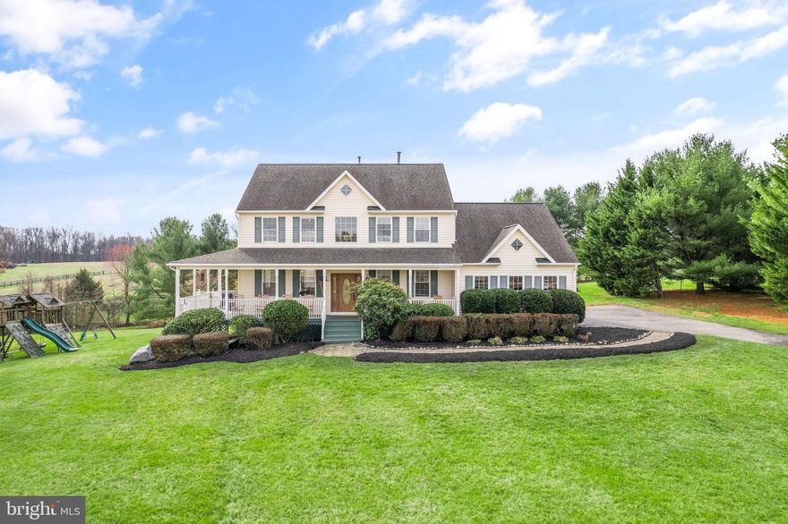 Escape to your own country oasis! This charming updated home sits on 5 acres of tranquility, boasting over 120 blueberry bushes, flourishing strawberry plants, raspberry bushes, apple trees, a pear tree, baby Christmas trees, a stocked pond, and even a chicken coup (chickens convey)! The interior is a perfect blend of modern comfort and rustic charm, featuring fresh paint, new flooring, and updated light fixtures throughout. The open concept main level includes a private office, a stylish kitchen with new stainless steel appliances overlooking the family room with a cozy fireplace.

The primary retreat on the upper level offers luxury with two closets, two sinks, a separate shower, and a soaking tub. Three additional bedrooms and a full bath complete this level. The fully finished walk-out basement is a versatile space, featuring a large den that could serve as a guest suite, a renovated full bathroom, a dry bar area, and ample storage.

Step outside to the fenced backyard with a deck and patio, perfect for entertaining. However, the true gem of this home is the expansive wrap-around porch, offering unparalleled privacy and serene views. And don't forget, high-speed Fios is available for all your connectivity needs. Your dream country retreat awaits – seize the opportunity to call this slice of paradise home! Water heater, sanitizer and softener are two years old. Roof newer when purchased. Home also features a generator interlock kit.