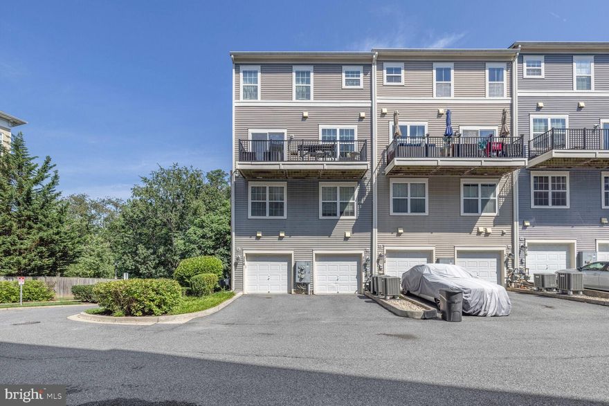 Beautiful three-level end-unit townhome located in the desirable Summit Crossing community. This 3-bedroom, 2.5-bathroom condo offers a thoughtfully designed layout with modern touches throughout. The main level boasts hardwood floors and a stylish kitchen complete with granite countertops, tall cabinetry, stainless steel appliances, and a convenient breakfast bar. The spacious primary suite features a large walk-in closet and an updated en-suite bath with a soaking tub and separate standing shower. Two additional bedrooms provide ample space. The fully finished basement includes a large family or recreation room and plenty of extra storage. Enjoy the convenience of a 1-car garage and easy access to MARC, Metro, shopping, and dining.