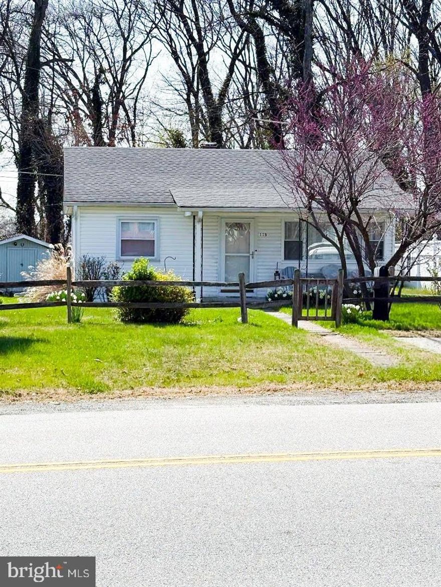 Welcome to this classic single-family home in Middle River, full of character, charm, and opportunity. Tucked into a peaceful setting and backing directly to woods, this property offers a nice sense of privacy and a serene natural backdrop—an ideal setting for creating a home that truly reflects your vision.  The outdoor spaces are a highlight, featuring a welcoming front porch perfect for quiet mornings, along with a rear deck overlooking the woods behind the back yard—providing multiple places to relax, gather, and enjoy the surroundings year-round.

The property also includes valuable bonus spaces:
A separate outbuilding with electricity and window A/C, ideal for a workshop, studio, or future home office, whatever vision a new owner has can come to life, with additional storage overhead as well. 
In addition there is a durable shed with electricity and built-in workbench, perfect for storage or projects. 

Inside, the home has been well cared for over the years and is ready to be enjoyed as it is, while also offering an excellent opportunity for buyers who may wish to update or modernize over time. With its solid structure and inviting layout, it provides the perfect canvas to make it your own.  Sold as-is, this home is ideal for those looking to settle into a comfortable space now.

Added Value:
Furniture currently in the home is included, offering a convenient starting point during your transition.

Located in desirable Middle River, you’ll enjoy the balance of a quiet, natural setting while still being close to shopping, dining, and major commuter routes.  This is more than just a home—it’s an opportunity to create something lasting in a setting that’s hard to find. Don’t miss your chance to make it your own.