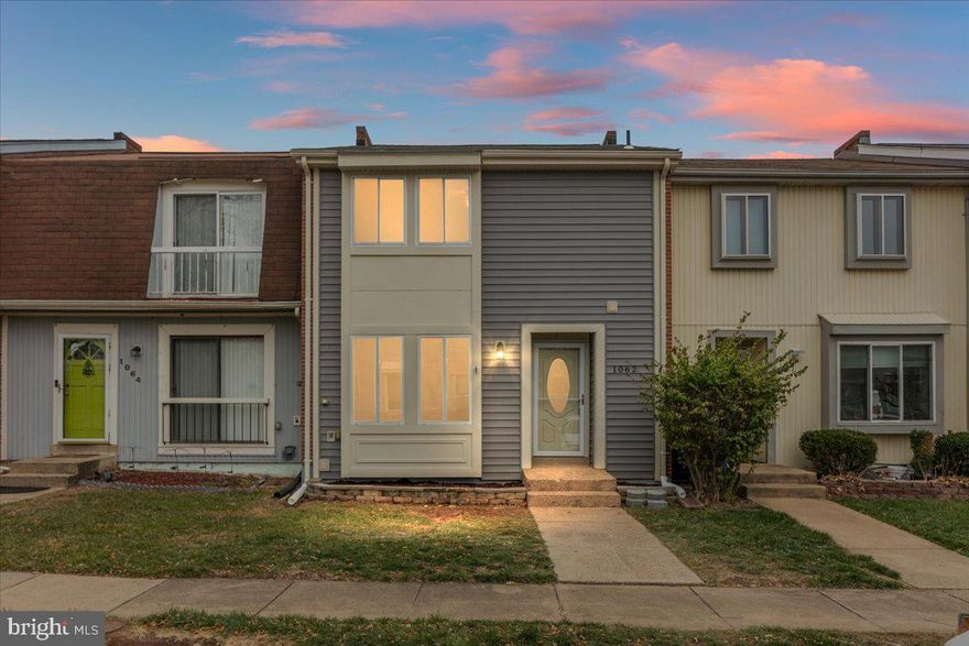 Welcome to this beautifully updated 3-bedroom, 2.5-bath townhome in sought-after Cavalier Park—over 1,800sqft and completely move-in ready with upgrades from top to bottom!

The main level features a traditional, spacious layout with a bright family room adorned with elegant crown molding, chair rail, and wainscoting. Just beyond, the updated kitchen offers maple cabinetry, granite countertops, brand new (2025) stainless steel appliances, and a brand new 2025 sliding glass door leading to the large deck. A convenient pass-through window opens into the formal dining room, complete with a stylish tile counter—perfect for serving meals, hosting, or setting up a drink station. The dining room also features crown and chair rail molding along with a modern brushed nickel light fixture. Brushed nickel fixtures continue throughout the home, tying everything together with a polished feel.

Enjoy brand new blonde laminate wood flooring throughout the entire main level, and fresh paint across all three levels. Step outside to a freshly stained (2025) deck with stairs leading to the yard, making outdoor dining and pet access effortless.

Upstairs, you’ll find brand new 2025 carpet throughout. The primary bedroom offers dual closets and a ceiling fan with light fixture. Two additional bedrooms provide good closet space, and the updated hall bathroom with tub shower completes the upper level.

The fully finished, walkout lower level adds incredible versatility, featuring a fresh carpet, a beautifully updated full bath with a walk-in shower, and a den—perfect as a guest space, home office, gym, or playroom. The den opens to the freshly landscaped, fully fenced backyard through another sliding door. The laundry area with brand new 2025 washer and dryer is also located on this level.

Parking is a breeze with two assigned spaces located directly outside your front door.

Live in the heart of Historic Herndon, just steps to shops, restaurants, bars, the library, and the W&OD Trail. With a Walk Score of 82, this location is a dream for walkers and cyclists. Commuters will love the easy access to Dulles Airport, the Reston Metro, Fairfax County Parkway, Route 28, and Route 7. Community amenities include a swimming pool and tot lot.

This is an ideal opportunity to settle into your new home before the new year—schedule your showing today!