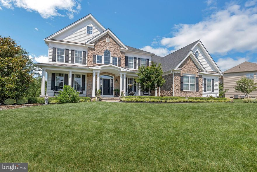 *OFFER DEADLINE @ 12 PM (Noon) on Sunday, 6/29/25* Welcome to 306 Rowland Lane, situated on a half-acre of manicured grounds, in a premium cul-de-sac location, within the exclusive enclave of New Britain Woods.  An elegant blue thermal flagstone walkway greets guests and leads to a deep front porch, enhanced by an aspen fieldstone veneer skirt, step side walls, and elegant stately columns. An impressive two-story foyer entry is flanked by dual butterfly staircases, custom closets, and the living and dining room areas—each featuring upgraded moldings. Just beyond the foyer, the family room is complemented by a gas fireplace and custom woven wood shades, striking the perfect balance between comfort and class. An abundance of natural light from double glass doors and triple windows fills the breakfast room and expansive kitchen. At the center of the space, an oversized Silestone Quartzite island in Pearl Jasmine with corbels is complemented by 3 pendant lights; custom cabinetry with slow-close doors, stainless steel appliances, stone tile backsplash, Sub-Zero refrigerator, gas stove, Asco dishwasher, and a custom pantry with shelves & wire pullout storage bins make this kitchen an absolute dream! A convenient third set of stairs to the second floor can be found adjacent to the breakfast area and family room. The main floor study with French doors, a well-appointed half bathroom, and a large mud room off the garage entry with custom built-in organizational shelving complete the main level. Upstairs, step through elegant double doors into a luxurious primary bedroom retreat featuring a tray ceiling and gleaming hardwood floors that flow seamlessly into a sophisticated office or reading nook, complete with custom-built-ins. Automatic room-darkening blinds create the perfect ambiance, and the spa-inspired primary bathroom boasts dual vanities, a private water closet, and a sleek stall shower. The primary closet is a masterpiece, equipped with a custom closet system, decorative lighting, abundant shoe cubbies, and extensive shelving for effortless organization. Each secondary bedroom is thoughtfully designed with rich hardwood flooring and elevated finishes. Two bedrooms share a Jack-and-Jill adjoining bathroom with a tub-shower combo, while the other two bedrooms feature private en-suite bathrooms. All bedrooms include custom closet systems for optimal storage and style. An additional 1200+ square feet of finished basement features CoreTec Newport Oak flooring, recessed lighting, built-in media center, French doors to the gym, an additional office or craft room, and an unfinished space for excess storage. Outside, an impressive, tiered paver patio with built-in gas grill, gas fire pit, pillar lighting, and LED step lighting enhances the secluded rear yard, complemented by a 54” black Jerith aluminum fencing. A 3-car garage is heated and features a remote-controlled ceiling storage rack, closets, tool area, shelving units, and rack organization system. Additional upgrades include custom window treatments throughout, security system, lawn sprinklers, hardwood floors throughout the majority of the home, meticulous landscaping (pear trees, Leyland cypress trees, Kwanzan cherry trees, Green Giants, boxwood, liriope, hydrangea), and so much more! See list of upgrades made during the original owner’s tenure. This special property adjoins open space featuring a walking path and pond with water fountain. Easy access to Rt. 202, Rt. 309, R5 SEPTA Train, & PA Turnpike and conveniently located close to shops, dining, community events, & nightlife in Chalfont, New Britain, & Doylestown Boroughs. Hiking, kayaking, fishing, and so much more can be found at Peace Valley Park/Lake Galena just a couple miles away. Schedule your appointment today!