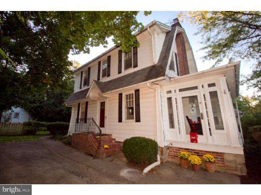 Delightful, sunny 3 bedroom 1&1/2 bath on charming tree-lined street in Springfield Township School District, Montgomery County. Large back yard, beautiful landscaping, and driveway parking. Newer kitchen with breakfast nook in addition to beautiful dining room.  Very large living room with fireplace. Enclosed porch/sunroom. Hardwood floors throughout. Original garage converted to studio workspace.Close to train, major roads and shopping.