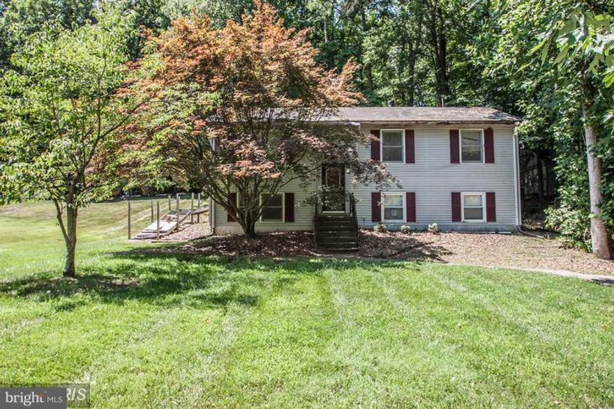 SOLD STRICTLY AS-IS. Single Family Home on Private Half Acre Lot at End of Street. Updated Kitchen and Hardwood Floors. Build Instant Equity with some TLC.  At least 10% EMD for Cash offers, 1% for Financed.