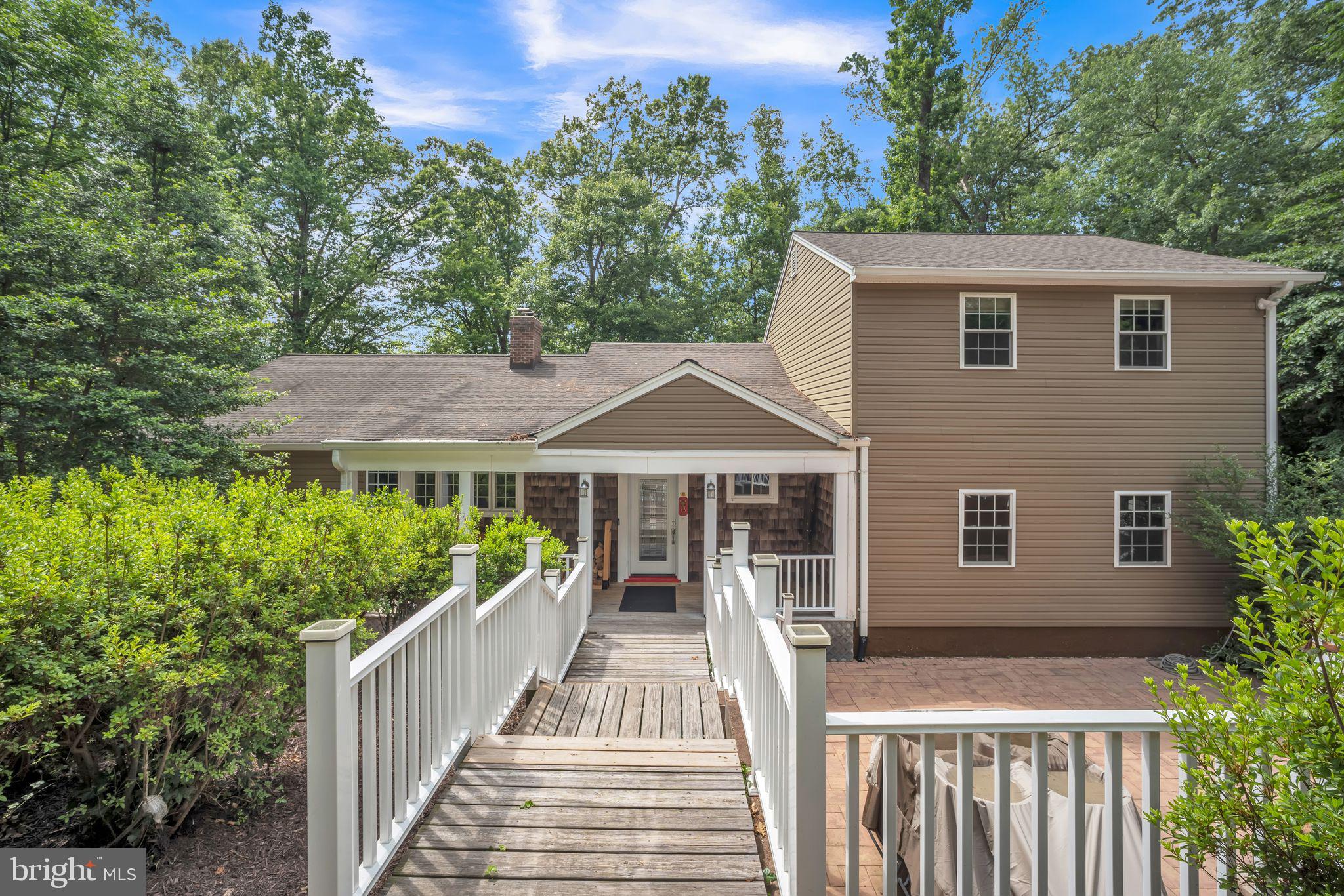 If you're looking for a stunningly tranquil home in the most convenient location, look no further! Nestled in a beautiful 1.62 acres of trees on a street that feels like a country retreat, 6600 Ridgeway still remains right down the street from Springfield's premier shopping, dining, grocery stores and major commuter routes like 395, 95, and 495. The home features hardwood floors, an inviting open concept living space and gourmet kitchen with stainless steel appliances. Entertain on your deck or just enjoy looking out at nature. Upstairs, the kitchenette allows for a separate living or rental space or an excellent office area. Spacious bedrooms and spa-like baths are throughout, and the lower level includes a large brick patio. Schedule a tour today!
