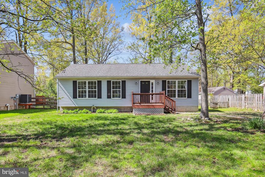 Beautifully updated one level home in sought after Cloverfields community. All new paint, new luxury vinyl plank in kitchen, dining room, living room, laundry room, hallway, and bathrooms, new carpet in bedrooms, and a fresh coat of paint. Primary bedroom has ensuite bathroom. Large deck for entertaining with spacious backyard with home sitting on over a third of an acre. Professionally redone  conditioned crawlspace to include french drain, insulation, sump pump, and service lights. Cloverfields community amenities include Beach, Pavillions, Grills, Boat Ramp, Marina with Rental Slips, Fishing Pier, Basketball Court, Horseshoe Pits, Swimming Pool, Kiddie Pool, Clubhouse, and Playgrounds.