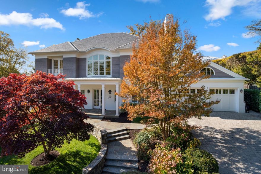 Ideally nestled in the sought-after Kent neighborhood of Washington, directly across from 37 acre Battery Kemble National Park, is this sprawling single family home situated on 9,904sq/ft lot. The home itself offers more than 8,400sq/ft of beautifully maintained living space including expansive rooms for entertaining and 5 spacious Bedrooms, each featuring their own En-suite Full Bath. Main Level consists of elegant yet comfortable living space, opening to a grand, light-filled Front Hall with 2-story high ceilings graciously adjoining through pocket doors the formal Dining Room, spacious Family Room (w/ fireplace) and Gallery which connects Study and light-filled Living Room (w/ fireplace). Eat-in Chef's Kitchen features top-of-the-line stainless steel appliances, including dual Wolfe ovens, and Breakfast Area with banquette seating. Dining Room, Living Room, and Kitchen all enjoy direct access to large Rear Deck/Covered Dining Area through French doors. Expansive Upper Level features Owner Suite with its own private Deck, En-suite Bath w/ 2 separate vanities, bath, and steam shower, and ample closet space between 2 Walk-in Closets and Linen Closet. Bedrooms 2, 3 and 4 all feature ample closet space. Upper Level complete with Office and additional Laundry. Above-Ground Lower Level features Guest/Au-pair Suite with En-suite Bath, Walk-in Closet, and enjoys access to Laundry Room with washer/dryer, sink and refrigerator. Lower Level also features 2 Offices, Recreation Room (w/ fireplace), Workshop, Utility Room, and 4-car Disappearing Parking below Garage. Complete with rear Sport Court, Covered Terrace, and additional 2-car heated Driveway parking.