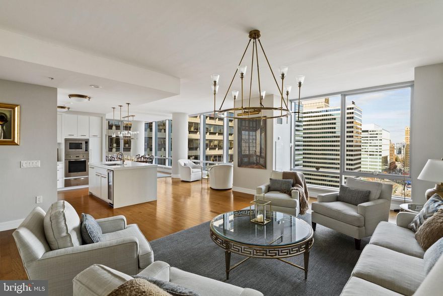 One-of-a-kind combined residence at The Residences at the Ritz-Carlton Philadelphia with a floor plan found nowhere else in the building. This northwest corner home spans approximately 2,542 sq ft and offers 2 bedrooms, den, oversized laundry room with sink, and 3.5 baths. The expansive primary suite features two full baths, two walk-in closets, two additional closets, and custom built-ins. Enjoy stunning views of Dilworth Plaza and iconic City Hall from the living and dining areas. The open layout includes a living room with gas fireplace, formal dining area, and a designer kitchen with Sub-Zero refrigeration, Viking gas range and ovens, microwave, warming drawer, Miele dishwasher, wine refrigerator, and more. Bathrooms feature Calacatta Gold marble, Bain Ultra soaking tubs, Duravit fixtures, and frameless glass showers. Maple hardwood floors throughout. Residents enjoy full-service luxury living including 24/7 concierge and doorman, chauffeur-driven car, state-of-the-art fitness center with indoor pool and yoga studio, residents’ lounge and media room, outdoor terrace, landscaped park with waterfall, dog park, and Ritz-Carlton hotel services.