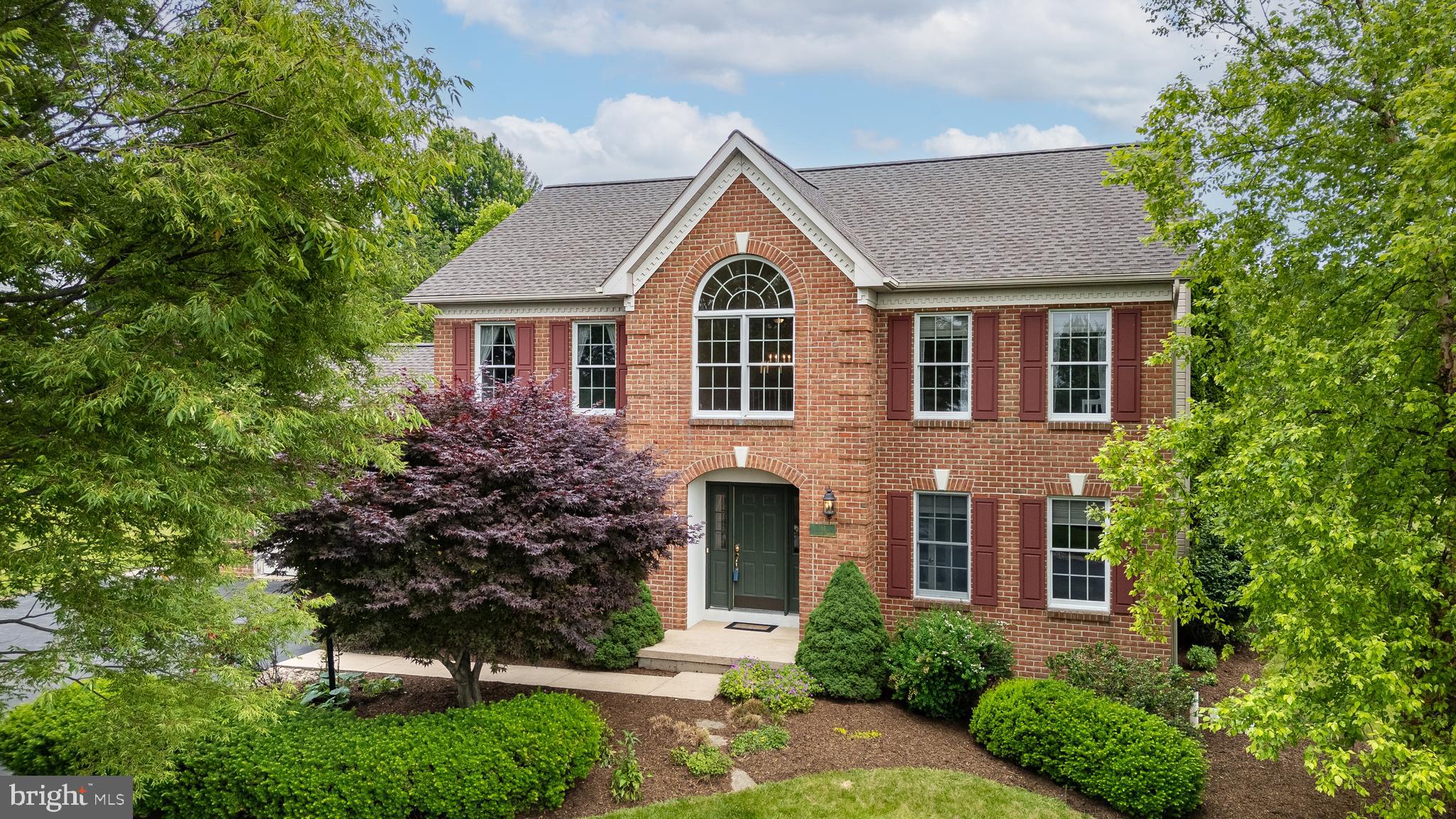 Welcome to your dream home in the heart of Oak Grove! This stunning classic two-story brick residence features 4 spacious bedrooms and 3.5 bathrooms, perfect for growing families or those who love to entertain. As you enter, you’re greeted by a dramatic 2-story hardwood entryway that sets the tone for the elegant formal dining room. The office, complete with glass pane French doors, provides a quiet space to work from home.
The inviting family room boasts a cozy wood-burning fireplace, seamlessly connecting to a large rear deck that overlooks the expansive yard and offers breathtaking views of Mount Nittany. Prepare meals in the spacious kitchen equipped with white cabinets, granite countertops, and stainless steel appliances, complemented by a generous eat-in area featuring a charming window seat. A 1/2 bath and a laundry room with closet, cabinets and wash sink complete the first floor.
Retreat to the luxurious primary bedroom suite, featuring a walk-in closet, a lavish whirlpool tub, a separate shower, dual sinks, and a private water closet for added convenience. The second floor also includes three additional bedrooms and another full bath, providing ample space for everyone.
The lower level is a fantastic bonus, offering plenty of room for games and entertainment, along with an additional full bath for guest convenience. This home sits on a desirable 1/2 acre corner lot, complete with panoramic and sunset views, a newer roof, a spacious yard, wide composite deck, and elegant paver patio—perfect for outdoor gatherings and catching the evening shade.
Enjoy the best of both worlds with this charming home, located close to parks and bike paths. Don’t miss the opportunity to make this exceptional property your own! And the active rental permit offers even more possibilities.