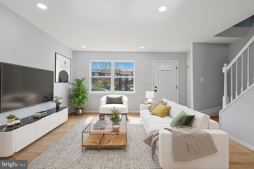 Completly renovated! New 3/4" Red Oak hardwood floors on main level. New carpet in bedrooms. Kitchen has new Bespoke Samsung appliances: French door refregirator, slide in range, built in microwave,whisper quiet dishwasher. All new light fitures. All new hardware. Large deck off kitchen. New heat pump.