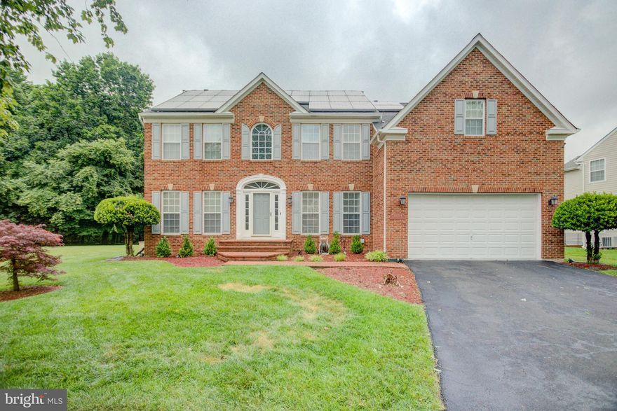 Incredible opportunity to own this former Ryan Homes Jefferson Square Model situated on a beautiful 1 acre lot. This specular home features 4 Bedrooms on upper level & Full Bath in the basement! Gourmet kitchen w/ Morning Room, Luxury Owners Suite with extension . Upgrades galore! The Gourmet Kitchen features Granite Countertops in Kitchen, Double Oven with 42" gas cooktop, Brand New Stainless Steel appliances.  The finished basement features a theater room, game room and sitting room. Additional features: 7.8KW Solar Panel System, generator, theater system with projector and so much more