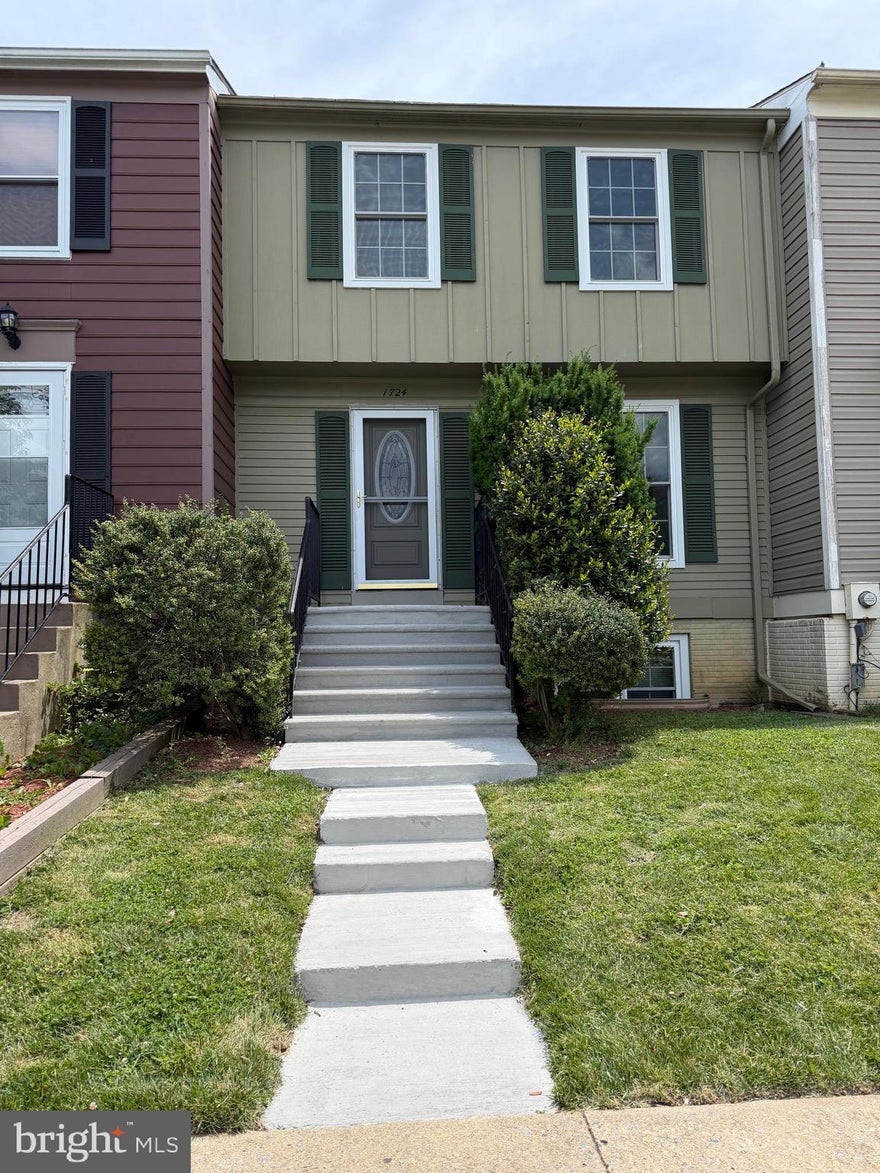 Charming & Move-In Ready 3-Bedroom Townhome in Carroll Park Manor, Frederick City. This well maintained townhome in sought-after Carroll Park Manor offers the perfect blend of comfort, style, and convenience in the heart of Frederick City. Freshly painted throughout with New Hardwood Flooring on the Main and Upper Levels, this home feels bright, and welcoming the moment you step inside.  Features: 2 Assigned Parking Spaces, Newly resurfaced concrete front steps and porch, Fenced backyard for outdoor enjoyment. Rear Deck with NEW Decking and Railings.     Main Level:  A front-facing kitchen with New Refrigerator and Garbage Disposal flows effortlessly into a spacious, open dining and living area. Step out onto the Upgraded Deck—perfect for morning coffee, evening grilling, or relaxing with friends.  Upper Level:  Generous sized Primary Bedroom, Bedrooms #2 & #3 and a Remodeled Full bathroom. The Primary Bedroom offers convenient private access to the bath, while the hallway entrance provides easy access for guests or family.  Lower Level: A versatile finished space featuring a front recreation room, a large family room, and a second Remodeled Full Bathroom. The Washer/Dryer closet and direct access to the Rear Yard make this level both functional and flexible—ideal for a home office, guest suite, or entertainment space. Don’t miss this turnkey townhome in one of Frederick’s most convenient neighborhoods. With fresh updates, low-maintenance living, and excellent proximity to downtown Frederick, parks, dining, and major commuting routes, this property is ready for you to simply move in and enjoy.