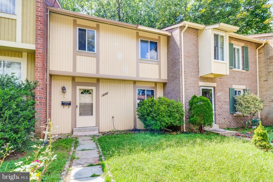 Beautiful Contemporary Townhouse,  3 level, 2 large bedrooms, 2 full and 1 half bath. Hardwood floors through out second level and upper level. Kitchen-updated cabinets, corian counter-tops. Updated bathrooms. Recess lights through out.** Dishwasher AS-IS**, ceiling fans. Minutes from schools, shopping and restaurants.