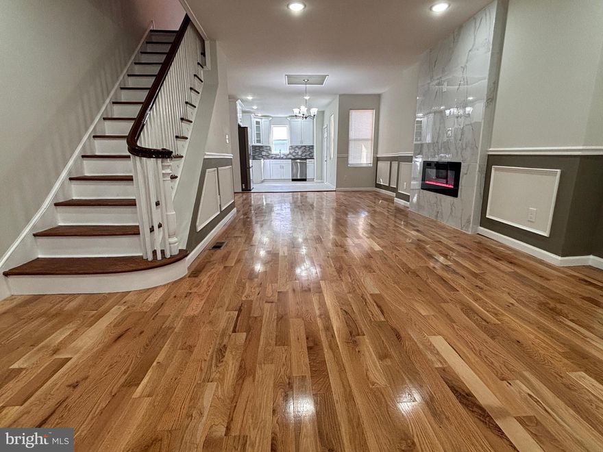 Move right in! This FOR SALE house is conveniently located in a quite Ogontz. This large 4 bedrooms 3 full bath bathrooms home is fully remodeled with elegance and comfort in mind. Open concept layout living and dining area with new hard wood flooring thru out the house, chair and base molding and recessed lighting. Living room also features one of a kind fireplace that is a statement piece. Beautiful chandelier completes a spacious dining room. The kitchen features brand new cabinets with state-of-the-art self-closing doors, granite countertop, sleek backsplash, and all stainless-steel appliances. The upstairs offers a master bedroom with on suite bathroom and very large closet; there are two additional bedrooms with plenty of closet space. Second floor also features a European spa like bathroom with imported vanity and elegant tile. No detail was overlooked. The finished basement boasts plenty of open space for entertaining and new carpet. Downstairs also features another spacious bedroom/office or playroom and full bath That's not all, this home features brand new HVAC, electric, plumbing, all permits have been pulled, and all inspections have been passed. Owner is a licensed real estate agent