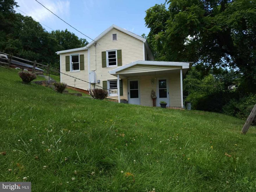 Come Checkout this great 2 Bedroom home that sits on just under a half-acre that could be converted easily to a 3 bedroom when you fix up this home to its original beauty. Home needs updating but it has great bones. This home includes small .03-acre lot just across the road where the old family homestead still stands that has been used for storage and additional parking, could be a great lot to add a medal building or workshop as it has electric to current structure. Great First-time home, Air BnB, or Rental. Close to the town of Front Royal. Please note when driving to home use Front Royal as city in the GPS.