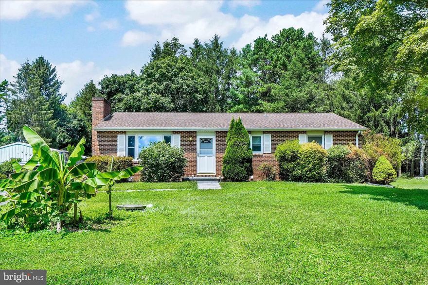 Well built brick ranch home sitting on a perfect 2.28 acre lot!  3 car detached garage.  Interior of home is in good condition, just needs to be refreshed.
Living room with brick fireplace.  Eat in kitchen with French Doors to rear deck!  Lovely shade trees;  gazebo in rear yard. Real hardwood floors in Living Room and 3 Bedrooms; 2 full baths with tile floors.
Full basement.