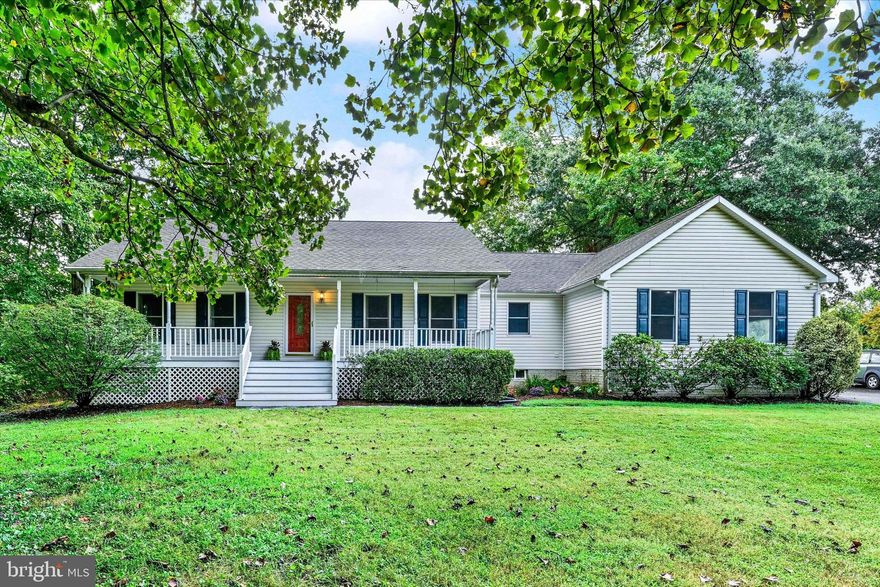 Welcome to 140 Old Solomon's Island Road.  Set on a picturesque and private two acres this charming home affords privacy and a flexible floor plan.  The main home consists of a large eat-in kitchen, a welcoming front living room with working fireplace, two sizable bedrooms with a shared bath, a convenient half bath, and a cozy flex space perfect for a formal dining room or den.  Down the hall you'll find a beautiful and spacious primary bedroom with vaulted ceiling, walk-in closet, and a luxurious primary bathroom.  The home also features an incredibly large sun filled finished lower level perfect for remote work or entertaining. This home is situated on a stunning two acres, with level backyard looking out onto a gorgeous view of a local tree nursery.  What the owners love: Living here feels like living on your own farmette.  We love that the house can easily accommodate guests and parties, but still feels cozy.  The property is wonderfully quiet and has great neighbors.  You can't beat the view, and the yard gets many summer rainbows. Come and enjoy the over 4200 finished square feet of space!