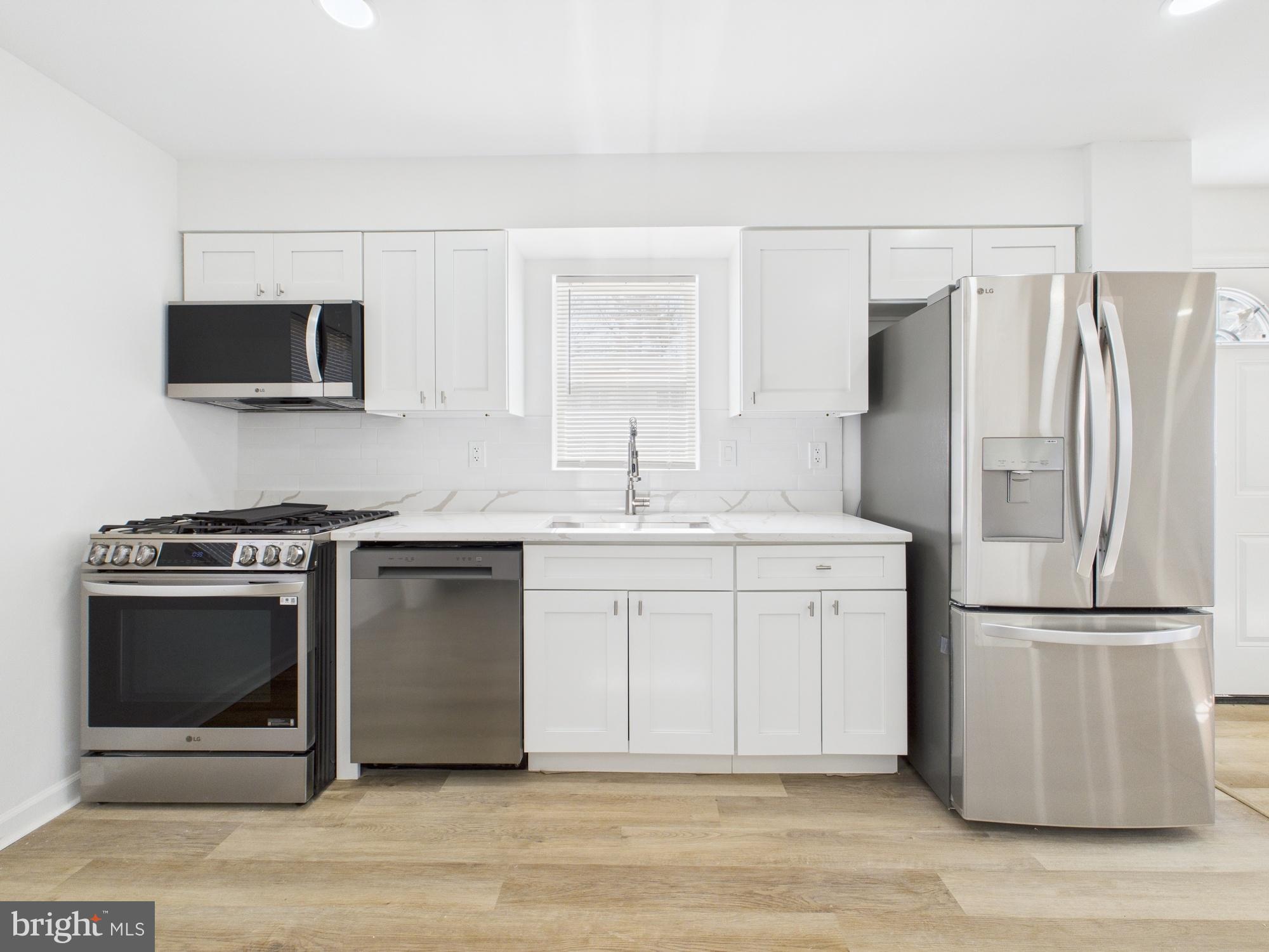 BACK ON THE MARKET AT REDUCED PRICE!
Amazing Renovation, stylish and updated spaces, modern bathrooms, top of the line appliances, and on top of all, your very spacious primary suite. A masterpiece of design an functionality. Live like you and your family deserve in the desirable neighborhood of Landover. Make this gorgeus four bedrooms three full bathrooms single house your family home; or easily make the walkout basement independent and rent it to help with the payments. This house boast: new waterproof wood laminated floors in all levels, new windows, new doors, new ceilings, new HVAC, new stainless steel appliances, gorgeus new cabinets and stone countertops, and three modernized and stylish full bathrooms. On the exterior count with a concrete driveway for two cars, and a concrete back patio with fenced backyard for privacy, relax and entertainment.
Enjoy the neighborhood park with renovated playground.