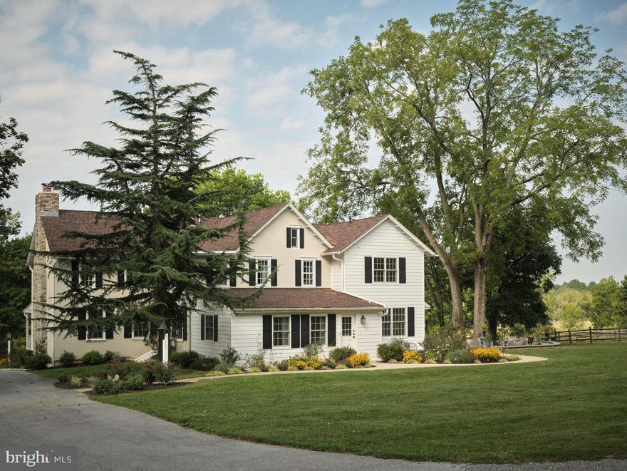 Don’t miss this exceptional opportunity to combine your love of equestrian activities with a totally renovated 1890 Farmhouse on 19.4 pristine acres in Radnor Hunt.  “Windy Hill Farm" is located in the heart of Willistown Township in a peaceful rural setting, yet close to all the conveniences of the local area.  Imagine enjoying colorful sunsets from your large flagstone terrace while watching horses graze in the fenced pastures.  This farmhouse, which was completely renovated in 2018, combines the best features and amenities of new construction with the charm of the late 19th Century.  This home features a large covered front porch, five bedrooms, five en suite bathrooms, hickory wide-plank flooring, two fireplaces, a chef-worthy kitchen with appliances by Wolf, Sub-Zero and Bosch, a spacious and bright breakfast boom, all with open access to the family room. A center hall floor plan with a formal living room and dining room, an ADA-accessible bedroom and full bath, a mud room and powder room complete the first floor.  The second story includes a lovely primary suite featuring an en suite bath with radiant heated flooring, soaking tub, separate vanities, and a large frameless glass stall shower.  Three additional bedrooms, all with en suite baths, a laundry room and walk-up access to the third-floor attic, complete the second level. Enjoy amazing views from every window on each floor. The property includes two parcels, with the larger 12.1 acre parcel being part of the Brandywine Conservancy.  This parcel with its rolling terrain includes a stream, fenced pastures with water stations and generous turn-out.  The remaining parcel of 7.3 acres includes the farmhouse, a 15-stall stable area with a European-style center courtyard, wash stall, feed room, tack room and additional fenced pastures.  A large two-story party barn, with a wood-burning stove, is a great place for the whole family to relax and entertain. The party barn includes a 30-foot garage with an extra-high ceiling that could easily accommodate a car lift.  A chicken coop with a large enclosed run for your chickens and a “She Shed” overlooking the 100 x 200 outdoor riding ring complete the primary parcel.  Being catty-cornered to Applebrook Golf Club makes it a short trip to the first tee!  The property is adjacent to miles of trails for pleasure and trail riding, all while providing quick access to the shops and restaurants of Malvern and West Chester, as well as the rails to Philadelphia and NYC.  Just a 30 minute drive to PHL.  Privacy with convenience make this a perfect location.  Award-winning Great Valley Schools and multiple private schools are an added bonus.  Make this property your Chester County oasis.  Please do not enter the driveway without a confirmed appointment.  Thank you!