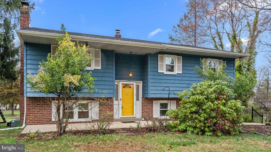 Welcome to this charming Bi-level home, nestled on a private half-acre lot in desirable Schuylkill Township! Move-in ready, this home offers a perfect blend of modern updates and classic charm. The main level features a beautifully updated kitchen with sleek tile flooring, stainless steel appliances, gleaming granite countertops, a custom-tiled backsplash, and ample cabinet space for all your culinary needs. The spacious living room, with its original hardwood floors, seamlessly flows into the dining room, which boasts sliding glass doors leading to a large rear deck—ideal for indoor-outdoor entertaining. The home offers three generously sized bedrooms, each with plenty of natural light and closet space. The modern hall bathroom has been thoughtfully renovated with tile flooring, a stunning tile tub surround with an intricate inlay, and a stylish updated vanity. The lower level is designed for both comfort and functionality. It features a massive family room, highlighted by an eye-catching brick fireplace with a wood-burning insert—a perfect spot to relax on cozy evenings. You'll also find added countertop space and cabinetry for extra storage, as well as access to a private rear patio, a convenient powder room, and a laundry/utility room. Step outside to the expansive backyard, where you'll find an elevated composite deck and a lower-level concrete patio, ideal for relaxing or entertaining on warm summer days. The large two-car attached garage and oversized driveway offer ample parking and storage space, while the spacious rear yard provides plenty of room for outdoor activities. Conveniently located just minutes from Phoenixville Borough, major roadways, shopping, and dining options, this home is truly a must-see. Don’t miss the opportunity to make this beautiful property your own!