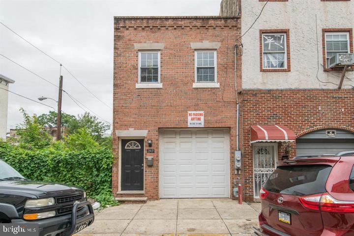 This unique property delivers excellent value and has great features for any investors looking for a large apartment, outdoor space, and a garage that can hold up to 5 cars w/ storage and a half bath! The two bedroom has an open floor plan with oak hardwood floors, kitchen with a gas stove, fridge, dining area, laundry room with washer/dryer, private new renovated deck with glass sliding doors and more. Make an appointment to see this gem today!