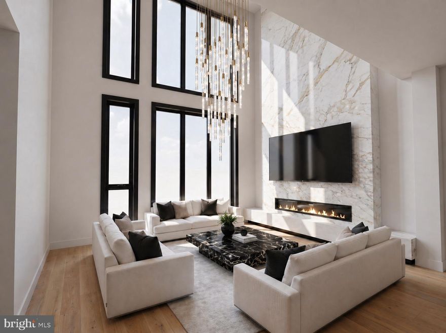 Introducing 139 S 24th Street, a newly constructed townhome in Fitler Square, located within the highly sought-after Greenfield School Catchment. This residence is curated through a quiet luxury approach designed for timelessness. Character is reimagined through modern architecture, with details that convey true sophistication.

Neighboring the private Fitler Club and Schuylkill River Trail, the home offers 4 bedrooms, 5 bathrooms, and over 5,100 square feet of living space. The 3+ car attached garage residence blends convenience and functionality, and includes a 10-year tax abatement.

Enter via a 6-stop elevator to the second level, where a custom, award-winning Joanne Hudson-designed kitchen introduces an elevated level of craftsmanship. Showcasing 13-foot ceilings, partially exposed glass cabinetry, Sub-Zero and Wolf appliances, a large Calacatta kitchen island and backsplash, and a private deck. The layout flows effortlessly into the dining and living areas, highlighted by dramatic 20-foot floor-to-ceiling windows, a custom floor-to-ceiling marble slab fireplace, and statement lighting.

The third floor offers a flexible loft space overlooking the living area below, positioned at the front of the home and surrounded by natural light from the 20-foot ceiling drop, complete with custom built-ins and a wet bar. Toward the rear, an en-suite bedroom and generous closets provide additional comfort and privacy. The fourth floor features two additional en-suite bedrooms, each thoughtfully designed with large closets.

The entire fifth floor is dedicated to the primary suite, offering a true retreat with a fireplace, wet bar, two walk-in closets, and a spa-style bathroom with an oversized shower, soaking tub, and double vanity. A private balcony further enhances the suite.
Crowning the home is a dual-sided roof deck, designed for entertaining with a wet bar and skylight elements in the pilot house, offering unobstructed Center City skyline views to the rear and Schuylkill River views to the front.

Minutes from Rittenhouse Square, enjoy true city living with top restaurants, luxury hotels, spas, retail, premier fitness, and more.
30th Street Station is just minutes away, providing direct access to New York City in approximately 90 minutes, along with seamless connectivity to the Main Line and surrounding suburbs. 

Sq Ft & taxes are the responsibility of the buyer to independently verify. Keller Williams & Megan Nicoletti do not warrant or guarantee the accuracy of any tax figures, assessments, or abatement approvals, all of which are determined solely by the City of Philadelphia. Any estimated taxes are for lender and settlement purposes only and may be based on vacant land assessment. Builder specifications, timelines, and final scope of work should be independently confirmed. Expected delivery Summer 2026. Listing information is deemed approximate and reliable, reflecting the current state of the project. Photos are architectural renderings for inspirational purposes only.

Additional Features & Upgrades:
Smart home integration including Control4 system and Lutron lighting control. Option for blackout shades in the primary suite. Roof deck designed for entertaining with the ability to incorporate a hot tub and outdoor kitchen with built-in grille. Heated floors in the primary bathroom. Temperature-controlled garage with additional refrigerator/freezer, electric vehicle charger, and option to install a car lift. Flexibility to convert part of the garage level into an additional en-suite bedroom if 3+ car parking is not required. Washer and dryer in the primary suite. Custom entry foyer cubbies available (or optional placement within the garage).

139 S 24th Street sets a new standard for modern city living.