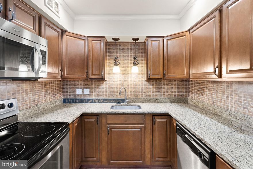 Welcome to this beautifully updated two-level townhome-style condo in the highly sought-after Cardinal Forest community of West Springfield! This inviting home features 2 spacious bedrooms, 1 full bath, and a convenient main level powder room, offering both comfort and functionality.
Step inside to find fresh paint throughout and new LVP flooring that enhances the bright, open layout. The spacious living room is flooded with natural light through a large sliding glass door, which opens to your private fenced-in patio—a perfect spot for relaxing or entertaining with minimal upkeep.
The updated kitchen boasts granite countertops, stainless steel appliances, and generous cabinet and storage space, along with a cozy eat-in area ideal for casual dining. Upstairs, you'll find two expansive bedrooms with ample closet space and a well-appointed full bath.
Additional highlights include an assigned parking space located directly in front of the unit and access to the wonderful amenities of Cardinal Forest—just moments from shopping, dining, parks, and major commuter routes.
Move-in ready and stylishly updated, this home is the perfect blend of comfort, convenience, and community living!