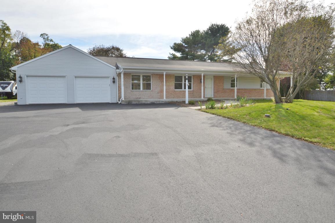 A completely remodeled 4BR 2.5 bath rancher in a nice country setting. Open concept living room, dining room and kitchen area is a great place to entertain. The master bedroom boasts a vaulted ceiling as well as a master bath. Basement is ready to finish with a potential hook-up for a wood stove for heat and a/c duct work. The oversized 2 car garage contains 2 extra rooms which would be perfect for a workshop. New kitchen, floors and vanities are just a few of the items on the attached remodel list. Call today to check all this property has to offer.