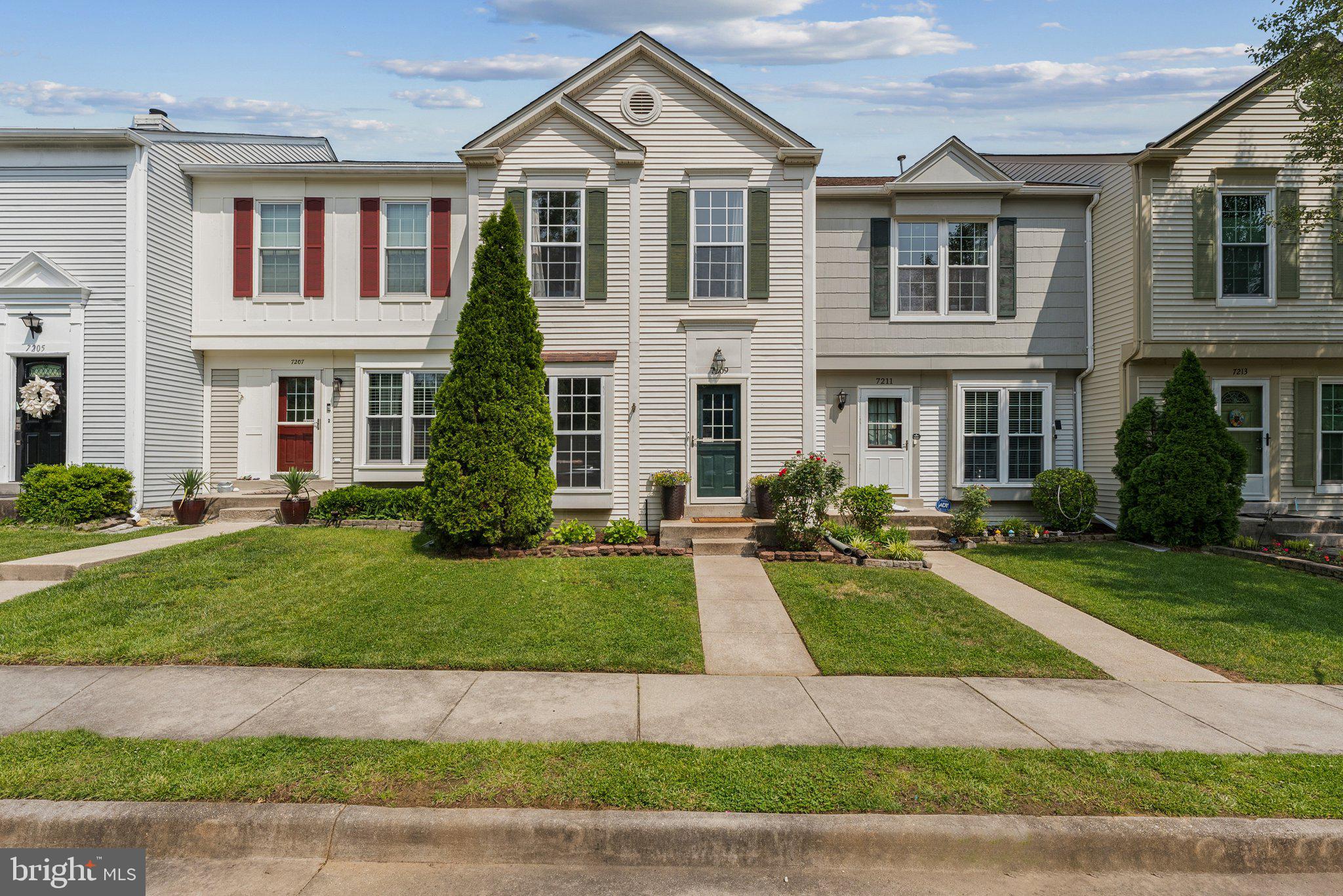 Gorgeous 2 bed, 3.5 bath, 3-level townhome in the Woodstone community. Fully fenced rear yard with deck and gardening space. Main level has vinyl plank flooring, wood burning fireplace, separate dining room, and half bath. Updated kitchen with stainless steel appliances, quartz countertops, and additional cabinet/countertop space. Upper level has full size washer/dryer. Both bedrooms with vaulted ceilings and attached bathrooms. Lower level has rec room, full bathroom, wet bar, and storage space. One assigned parking spot with ample visitor parking. New roof 2022. New blown-in insulation in attic 2022. New electrical panel 2024. New furnace 2022. New AC compressor 2025. New water heater 2023. New kitchen appliances 2023. New washer/dryer 2023. Short walk to Huntley Meadows Park.