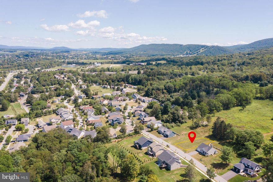 Opportunity awaits in Boalsburg Village! Build your dream home on this desirable lot in the sought-after Hawk Ridge development. Bring your own builder and take advantage of hassle-free living with included amenities such as lawn care and snow removal.  Public Water, Public Sewer, and Natural Gas available.  Ideally situated within walking distance of the charming shops and restaurants of historic Boalsburg, and just minutes from Penn State.