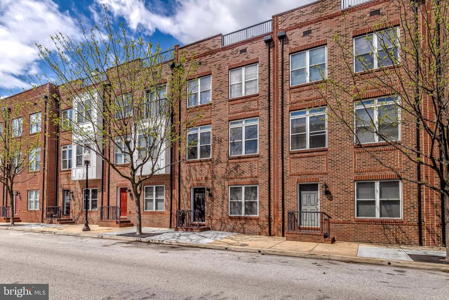Light-filled, garage townhome in McHenry Point!  This 20 foot wide home's main living level offers an open floor plan with a large dining and living room featuring hardwood floors and custom moldings. The gourmet kitchen is appointed with stainless steel appliances and granite counter tops. Adjacent to the kitchen is a bonus room that offers additional table space or a casual living space. Upstairs you will find the bedroom level, which includes the master suite, two guest bedrooms, and a guest bathroom. The master suite offers a large bedroom that can accommodate a king size bed, a walk-in closet, and a private bathroom. Up top you will discover a wet bar with fridge in the penthouse that leads out to a massive roof top deck. The entry level of the home includes an office/guest bedroom, half bath, laundry & 2 car garage.   Contact the listing agent for a link to the 3D tour https://my.matterport.com/show/?m=QQ9rvW1sEH7&brand=0  Available May 15th.  Pets allowed on a case by case basis.