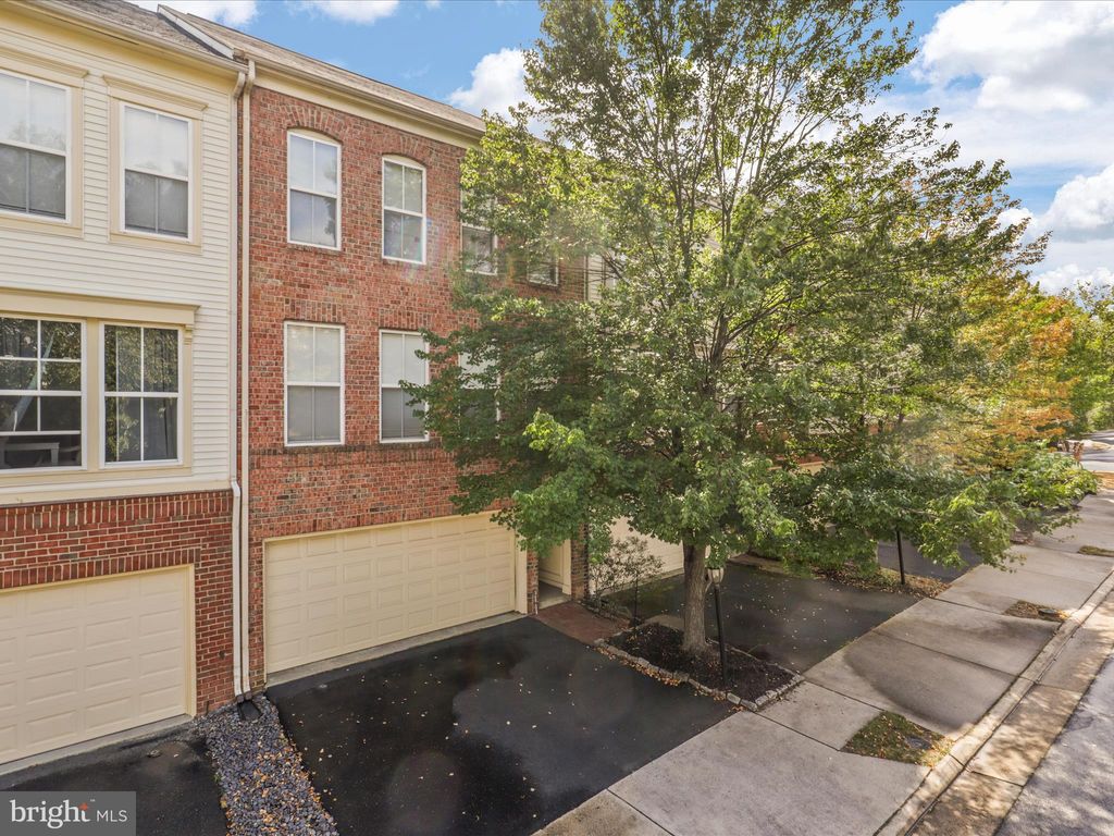 Photo of 42539 Regal Wood Drive, BRAMBLETON, VA 20148 (MLS # VALO2106098)