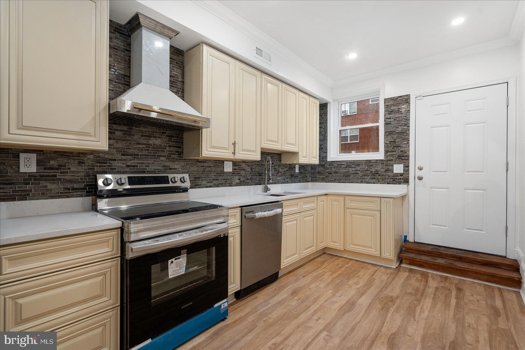 **TENANT OCCUPIED** INVESTOR SPECIAL! Newly remodeled 3BR/1BA Townhome located on a tree-lined street. Step inside to a bright and airy main floor offering luxury flooring throughout the large living room, spacious dining room, and brand new kitchen. The dining room features a custom wall of shelving, and an arched entry into the kitchen. The kitchen features stainless steel appliances including an electric range and range hood, plenty of cabinets to the ceiling, granite countertops with a complementing backsplash, and a large double stainless sink. Onto the second floor offering a large primary bedroom, two sizable secondary bedrooms and a full bath. The lower level offers a blank slate for adding additional living space. This home is move-in ready with so much to offer new homeowners including new HVAC, new roof, upgraded electric panel, replacement windows, updated siding on back of house, and so much more. Imagine all this and in close proximity to shopping, restaurants, and commuter routes. ANY & ALL OFFERS CONSIDERED!!
